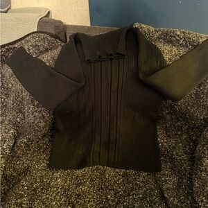 Black Ribbed Sweater with Ruffle Detail